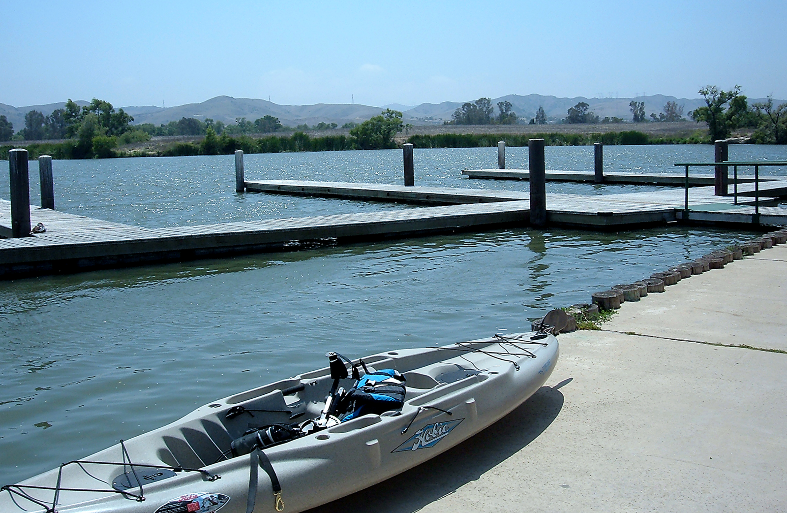Prado Lake with kayak near the water dock.p.