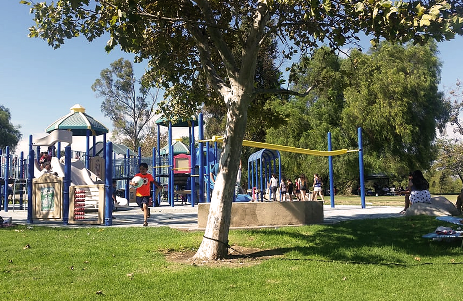 Children playing at Prado park playground.