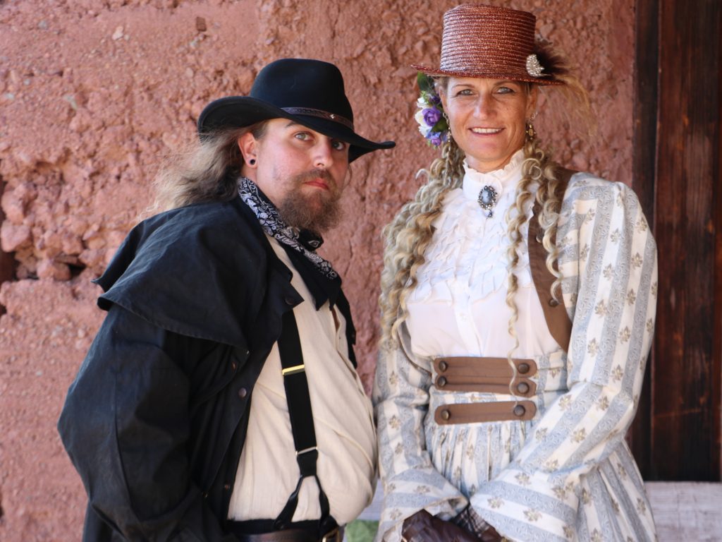 People dressed in western period clothing