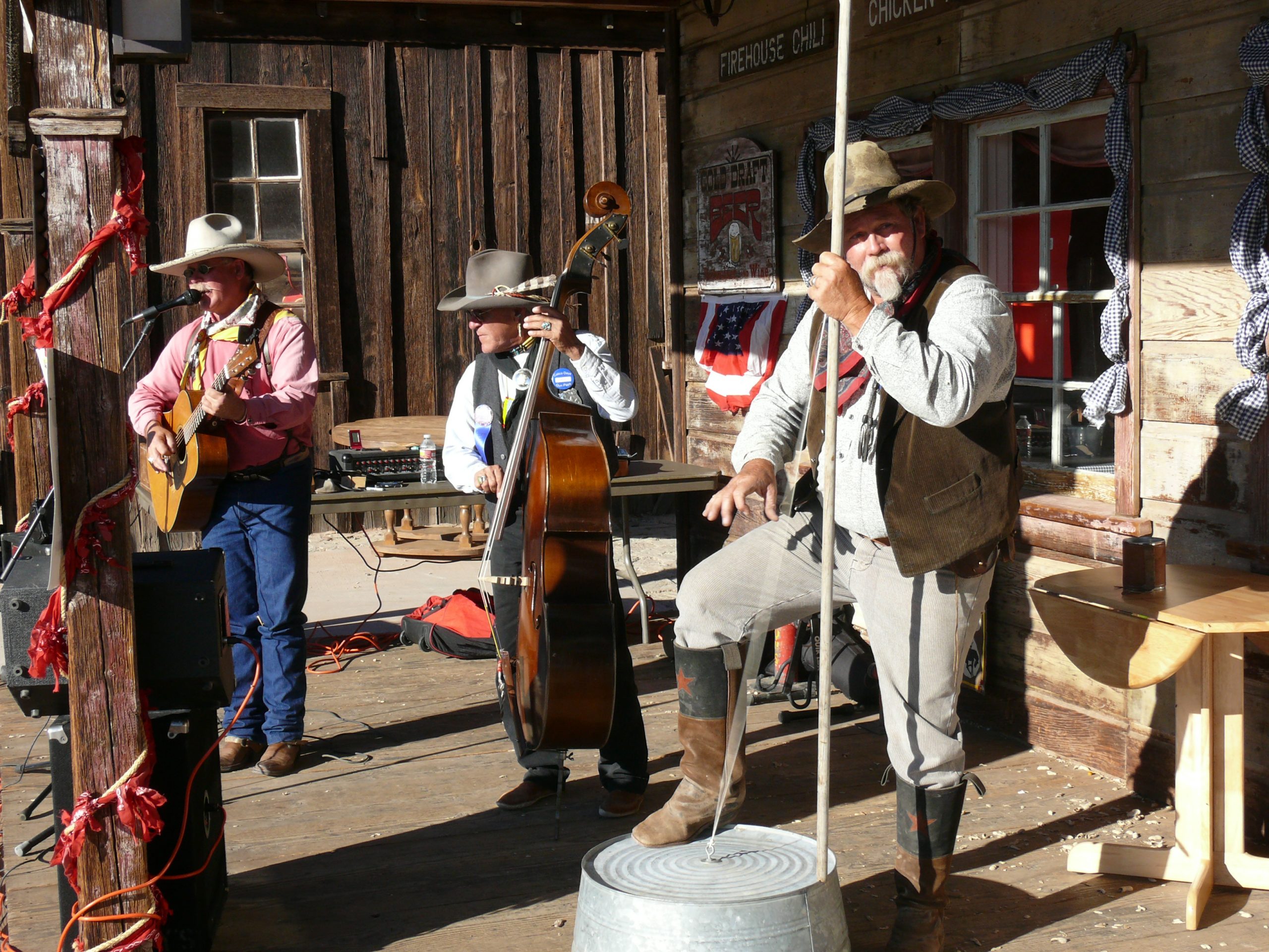 Men playing instruments and dressed up in 1800s attire at Calico Ghost Town.