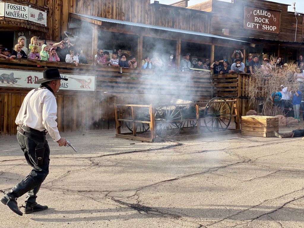 A volunteer Old West gunfighter performs a gunfight at Calico Ghost Town.