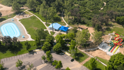 A drone shot of Glen Helen swim complex including the waterslides, pool, pool house and splashpad.