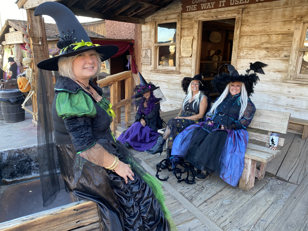 A group of women dressed up in witches costumes at Calico Ghost Town Ghost Haunt in 2023.