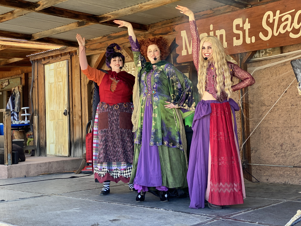 A trio of women dressed as Hocus Pocus characters performing at Calico Ghost Town Ghost Haunt in 2023.