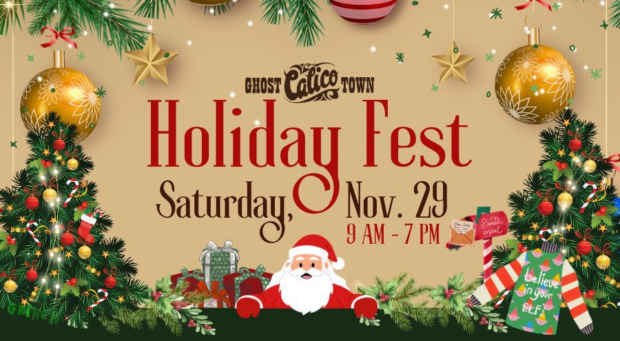 Large Christmas ornaments with garland and Christmas trees on the right and left with Santa Claus in the middle. An ugly sweater and Santa's mailbox with poinsettias and wrapped Christmas gifts near the left tree.