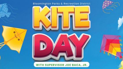 Kites against a blue sky with the words Bloomington Parks & Recreation District Kite Day with Supervisor Joe Baca, Jr.